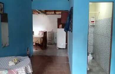 Imagem: A casa possui 3 Dormitórios, 2 Banheiros, 2 Vagas na garagem