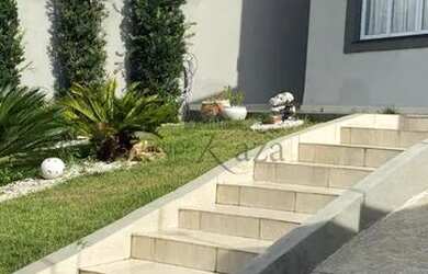 Imagem: A casa possui 3 Dormitórios, 4 Banheiros, 4 Vagas na garagem