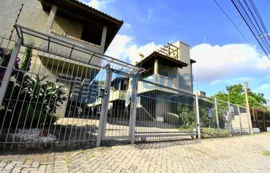 Imagem: A casa possui 2 Dormitórios, 2 Banheiros, 1 Vaga na garagem