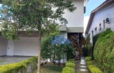 Imagem: A casa em condomínio possui 4 Dormitórios, 5 Banheiros, 4