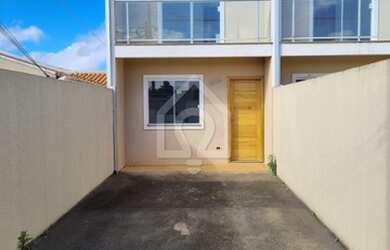 Imagem: A casa possui 2 Dormitórios, 2 Banheiros, 2 Vagas na garagem