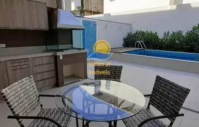 Imagem: A casa em condomínio e possui 4 Dormitórios, Suítes, 5 Banheiros