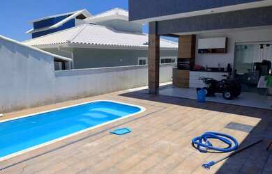 Imagem 12: Pertinho da PRAIA. Acomodam 12 pessoas, 5 Vagas na garageme3 Dormitórios