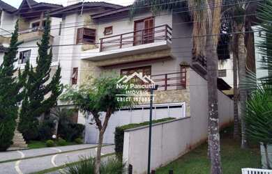 Imagem: A casa em condomínio à venda possui 3 Dormitórios, 5 Banheiros