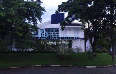 Imagem: A casa possui 5 Dormitórios, 5 Banheiros, 4 Vagas na garagem