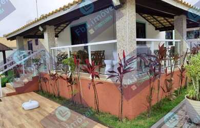 Imagem: A casa possui 4 Dormitórios, 4 Banheiros, 3 Vagas na garagem