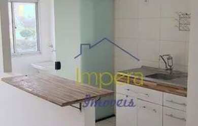 Imagem: O apartamento possui 2 Dormitórios, 1 Banheiro, 1 Vaga na garagem