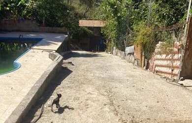 Imagem: A casa em condomínioe possui 3 Dormitórios, 3 Banheiros, 5