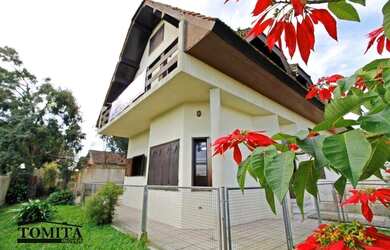 Imagem: A casa possui 5 Dormitórios, 5 Banheiros, 2 Vagas na garagem