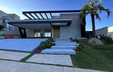 Imagem: A casa em condomínio possui 4 Dormitórios, 5 Banheiros, 4