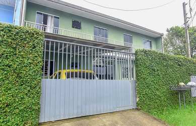 Imagem: A casa possui 5 Dormitórios, 4 Banheiros, 2 Vagas na garagem