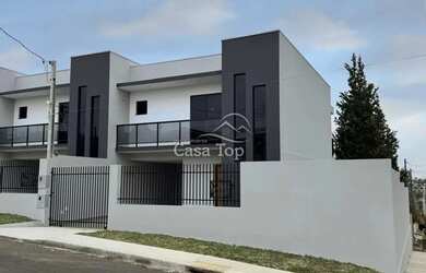 Imagem: A casa possui 3 Dormitórios, 3 Banheiros, 2 Vagas na garagem