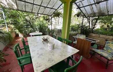 Imagem: A casa possui 5 Dormitórios, 4 Banheiros, 2 Vagas na garagem