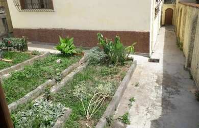 Imagem: A casa possui 4 Dormitórios, 2 Banheiros, 3 Vagas na garagem