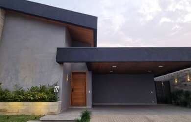 Imagem: A casa possui 3 Dormitórios, 5 Banheiros, 2 Vagas na garagem