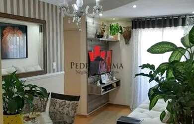 Imagem: O apartamento possui 2 Dormitórios, 1 Banheiro, 2 Vagas na