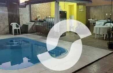 Imagem: A casa possui 4 Dormitórios, 2 Banheiros, 2 Vagas na garagem