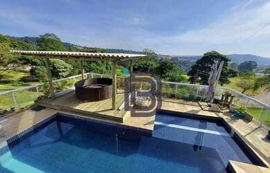 Imagem: A casa em condomínio possui 5 Dormitórios, 5 Banheiros, 5