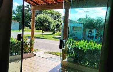 Imagem: A casa possui 2 Dormitórios, 1 Banheiro, 1 Vaga na garagem