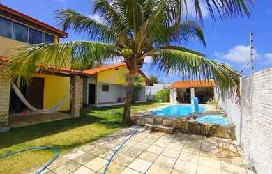 Imagem: A casa possui 3 Dormitórios, 4 Banheiros, 4 Vagas na garagem