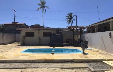 Imagem: A casa possui 4 Dormitórios, 5 Banheiros, 5 Vagas na garagem