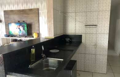 Imagem: A casa possui 2 Dormitórios, 1 Banheiro, 1 Vaga na garagem