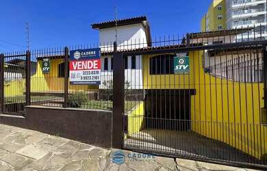 Imagem: A casa possui 3 Dormitórios, 3 Banheiros, 5 Vagas na garagem