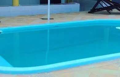 Imagem: A casa possui 4 Dormitórios, 3 Banheiros, 4 Vagas na garagem