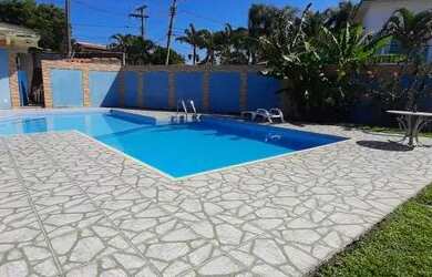 Imagem: A casa possui 5 Dormitórios, 5 Banheiros, 5 Vagas na garagem