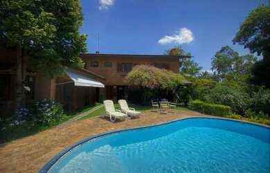 Imagem: A casa em condomínio possui 4 Dormitórios, 5 Banheiros, 5