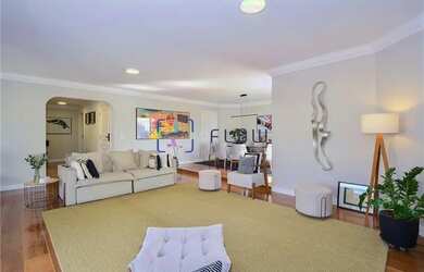 Imagem: O apartamento possui 4 Dormitórios, 5 Banheiros, 3 Vagas na