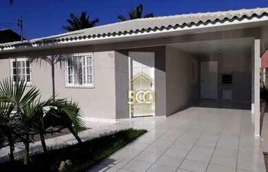 Imagem: A casa possui 4 Dormitórios, 3 Banheiros, 2 Vagas na garagem