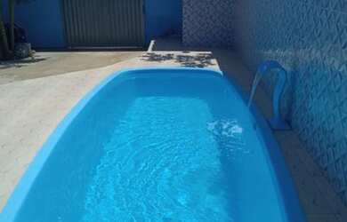 Imagem: A casa possui 2 Dormitórios, 3 Banheiros, 2 Vagas na garagem