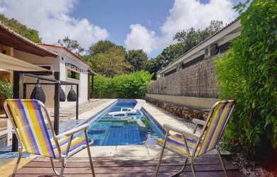 Imagem: A casa possui 3 Dormitórios, 3 Vagas na garagem, Churrasqueira