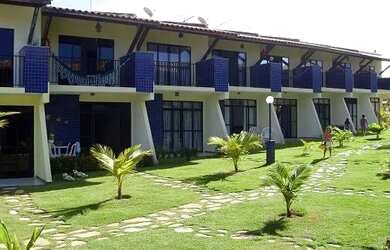 Imagem: A casa possui 2 Dormitórios, Acomodam 6 pessoas, 2 Vagas na