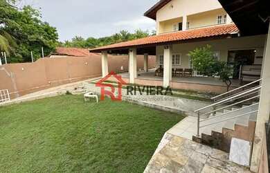 Imagem: A casa possui 5 Dormitórios, 4 Banheiros, 5 Vagas na garagem