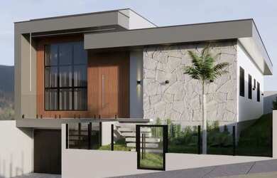 Imagem: A casa possui 3 Dormitórios, 2 Banheiros, 2 Vagas na garagem