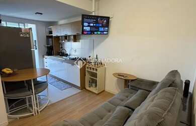 Imagem: O apartamento possui 2 Dormitórios, 1 Banheiro, 2 Vagas na