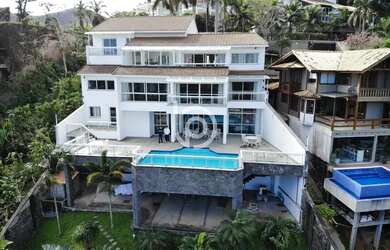 Imagem: A casa em condomínio possui 4 Dormitórios, 5 Banheiros, 5