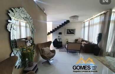 Imagem: A casa possui 3 Dormitórios, 5 Banheiros, 3 Vagas na garagem