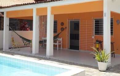 Imagem: A casa possui 4 Dormitórios, 3 Vagas na garagem e está localizado