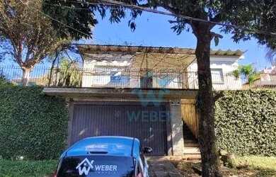 Imagem: A casa possui 3 Dormitórios, 4 Banheiros, 1 Vaga na garagem