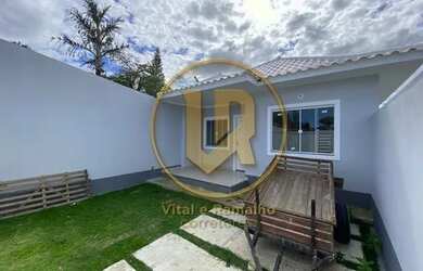 Imagem: A casa possui 2 Dormitórios, 2 Banheiros, 2 Vagas na garagem