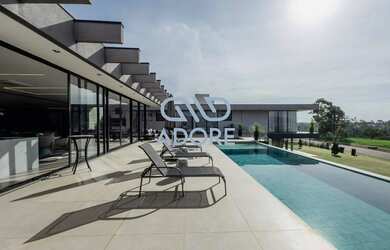 Imagem: A casa em condomínio à venda possui 5 Dormitórios, 5 Banheiros