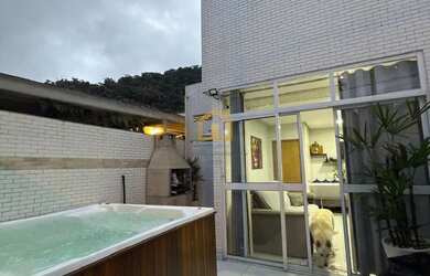 Imagem: A casa possui 3 Dormitórios, 4 Banheiros, 1 Vaga na garagem