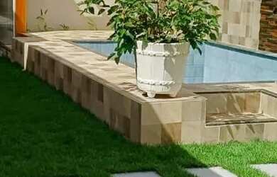 Imagem: A casa possui 2 Dormitórios, 3 Banheiros, 3 Vagas na garagem