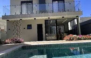 Imagem: A casa possui 3 Dormitórios, 4 Banheiros, 2 Vagas na garagem