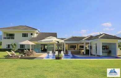 Imagem: A casa em condomínio possui 5 Dormitórios, 5 Banheiros, 5