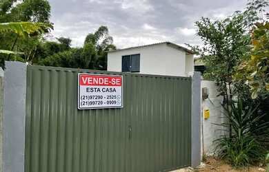 Imagem: A casa possui 2 Dormitórios, 2 Banheiros, 3 Vagas na garagem