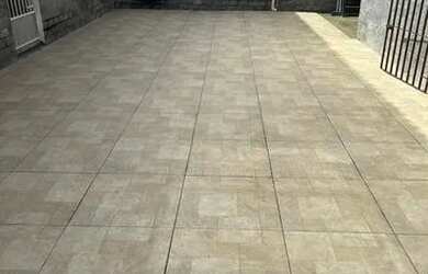 Imagem: A casa possui 3 Dormitórios, 3 Banheiros, 3 Vagas na garagem